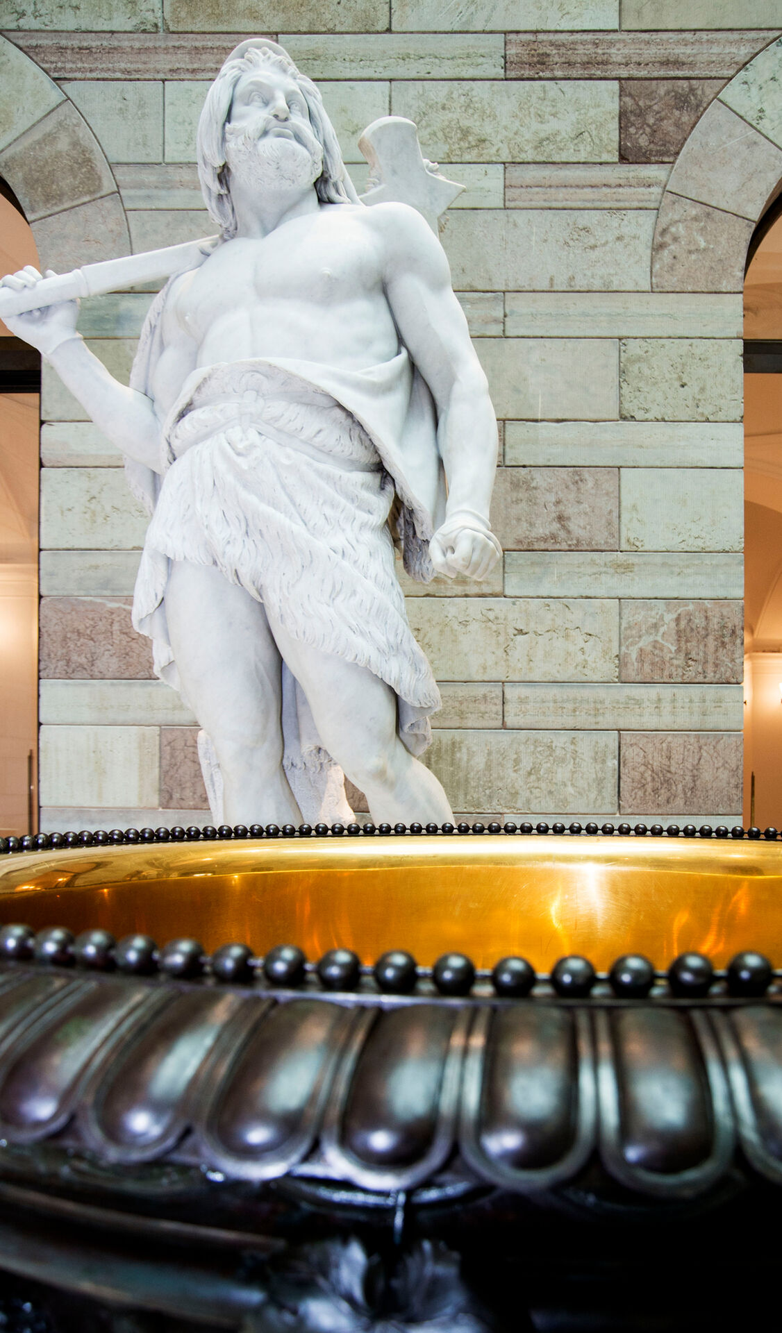 Detail of a gold plated urn in cast iron. Fogelberg's sculpture of Thor in the background.