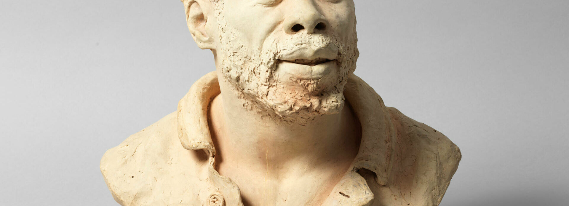 Porträttbyst föreställande en afrikansk man.