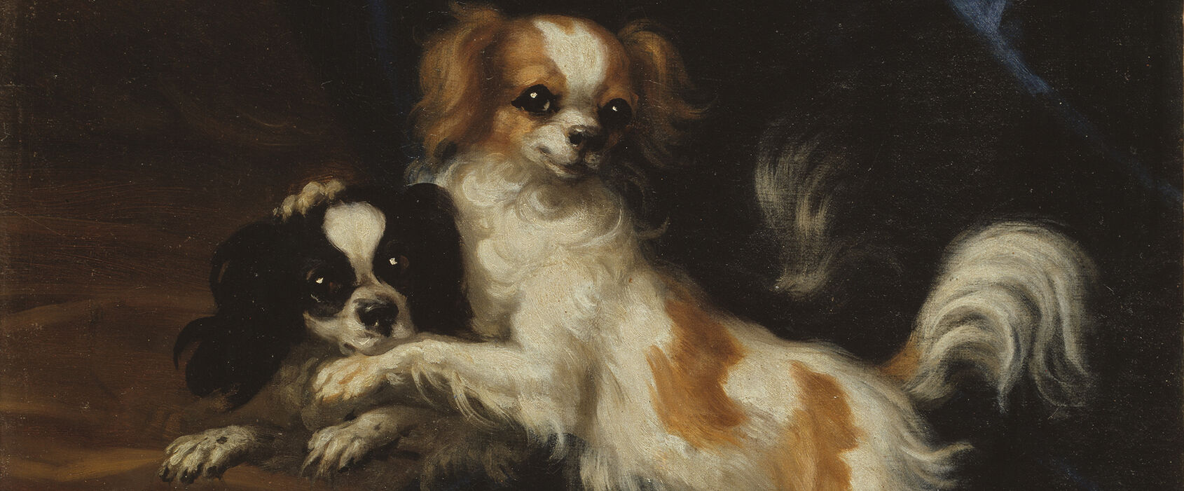 Målning föreställande två hundar på blått sidentyg.