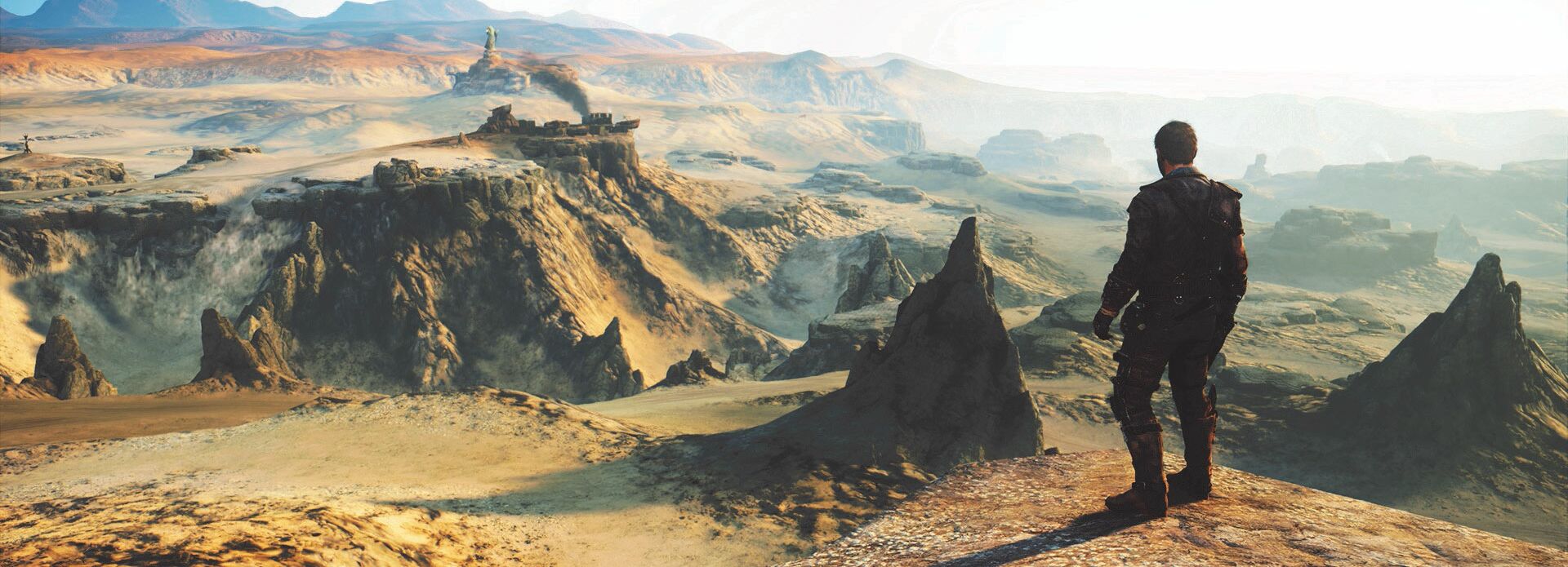 Bild från dataspel. en man står och tittar ut över ett kargt berg- eller ökenlandskap.