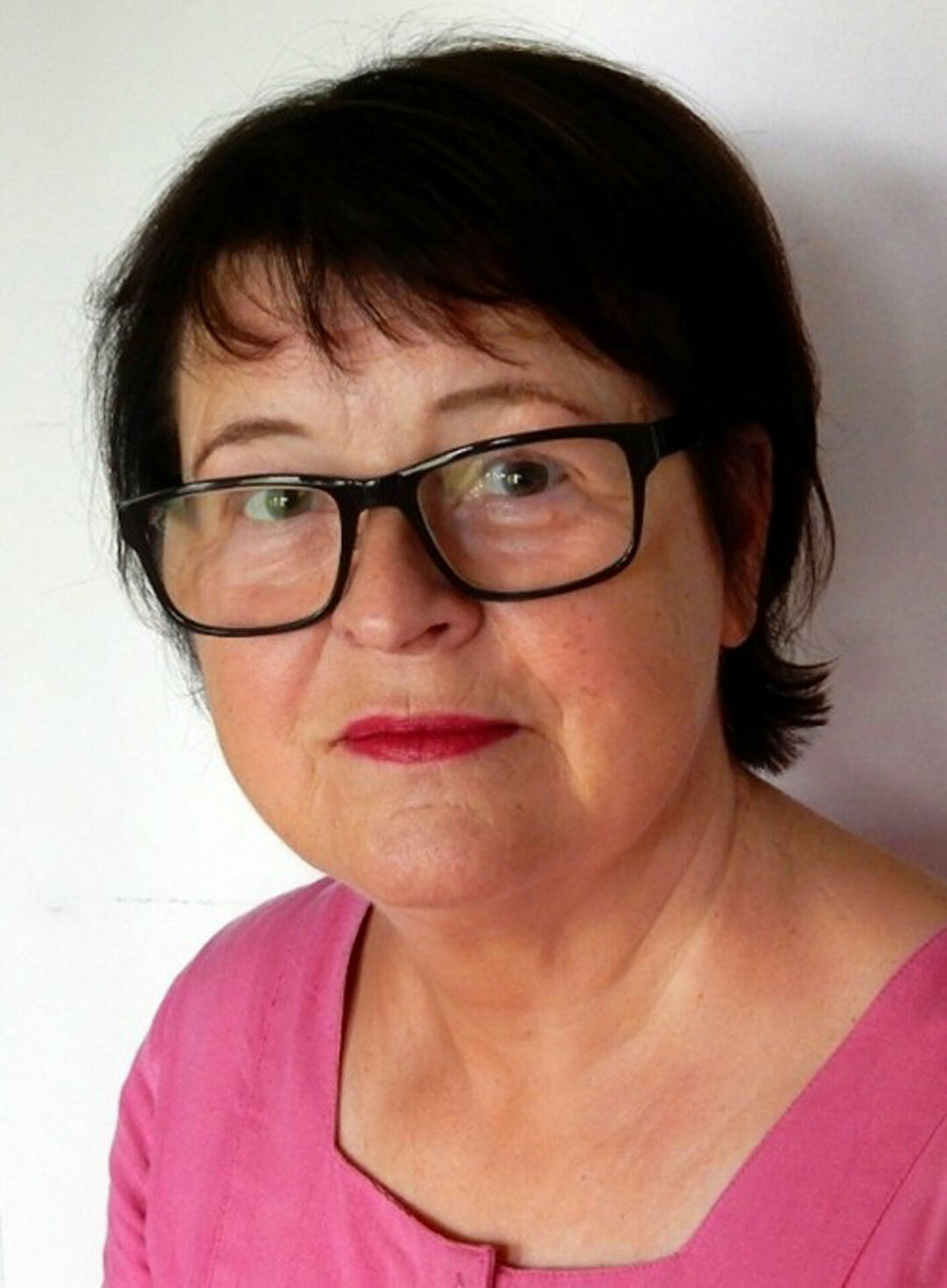 Fotografiskt porträtt av en kvinna.