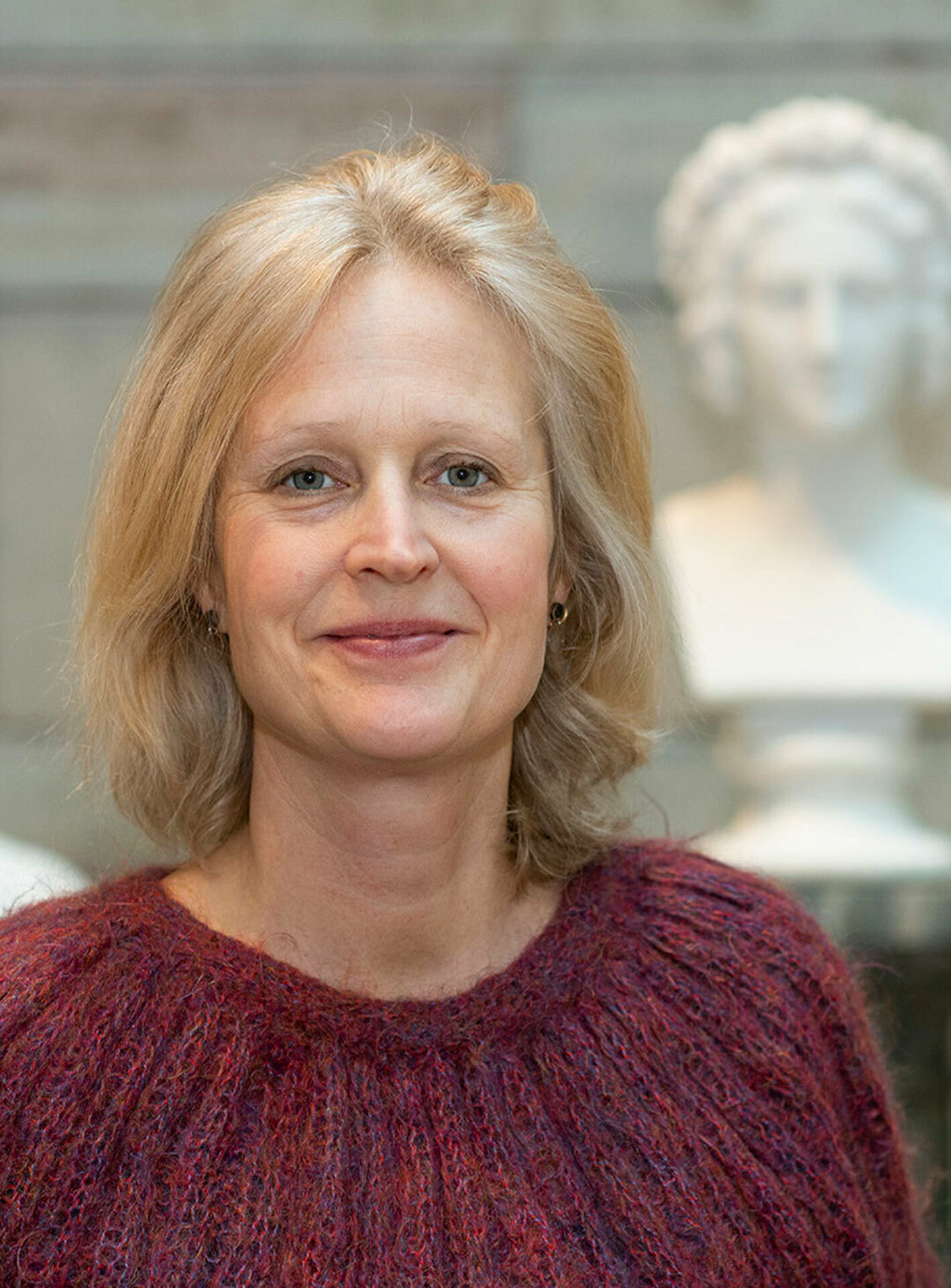 Fotografiskt porträtt av en kvinna.