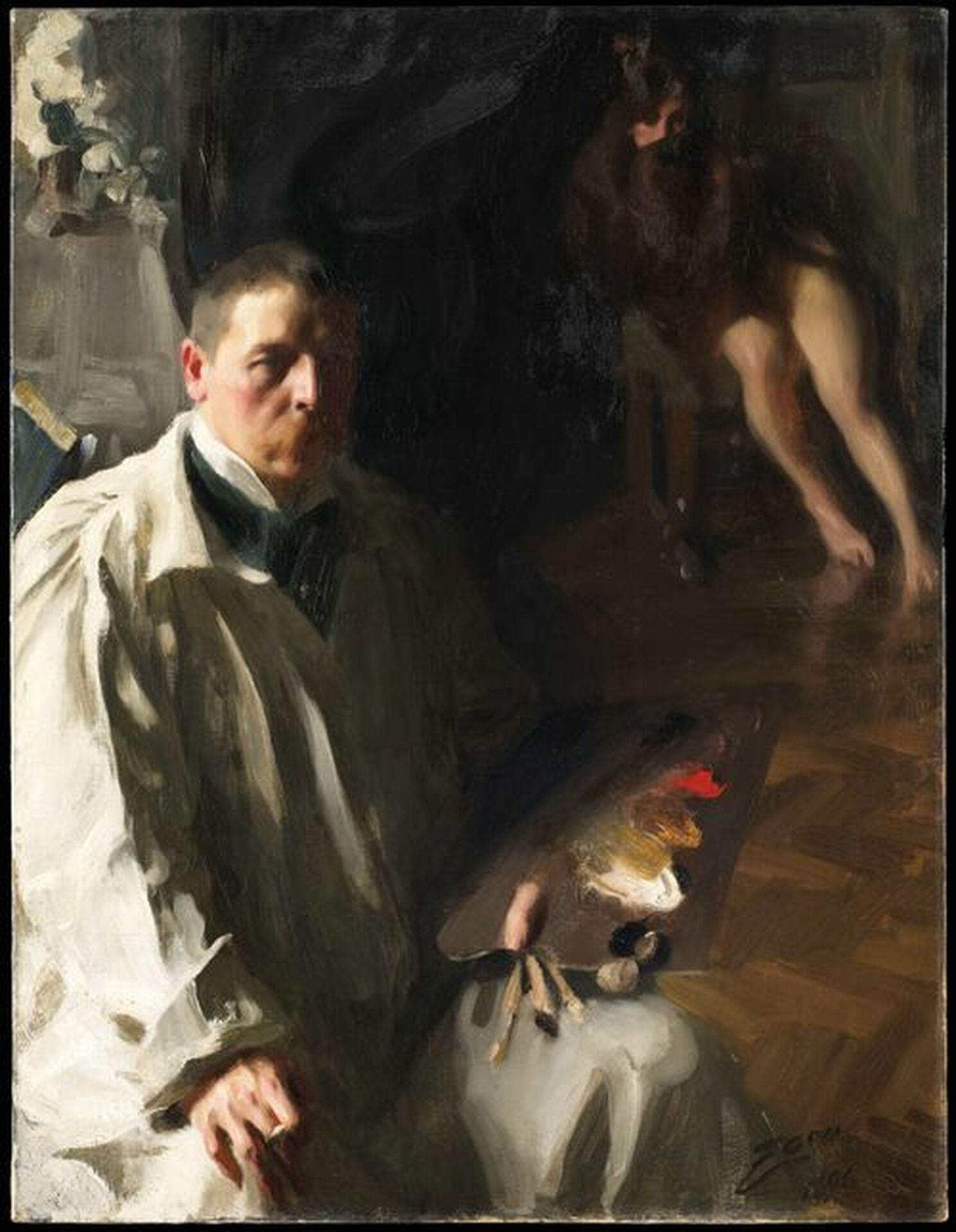 I förgrunden sitter Anders Zorn i sin ateljé. Ljuset faller på hans tinning. Han har allvarlig blick, rak näsa, kortklippt hår och rödlätt mustasch. Zorn bär vit målarrock. I ena handen håller han penslar och en palett med färg av rött, gult och vitt. I bakgrunden, i rummets dunkel, sitter en kvinna på en stol, snett lutad mot ryggstödet och med benen lätt utsträckta över parkettgolvet. Hon är naken och har långt rödbrunt hår som hon sveper runt sig så att överkroppen skyls. Zorns vita målarrock och belysta ansikte står i kontrast till rummets bruna färgtoner.