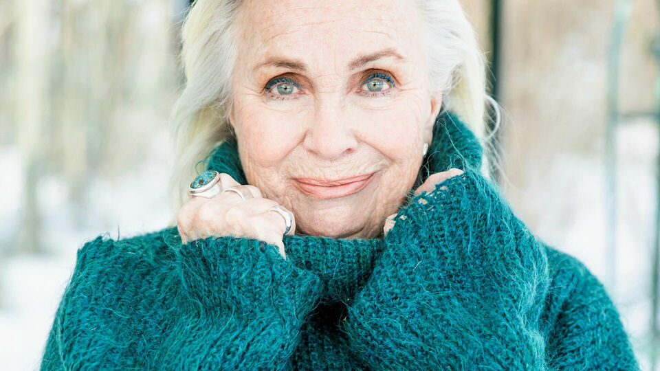 Fotografiskt porträtt av en kvinna.